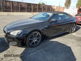 2015 BMW M6 z VIN WBSLZ9C55FD651228, wystawiony jako Copart lot #85511854 z przebiegiem 74 897 mil mil oraz Szkoda całkowita • Salvage title. Historia ofert i sprzedaży dostępna na DreamBid. Obrazek 1.