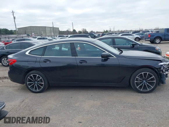 2019 BMW 6 Series 640i xDrive with VIN WBAJV6C50KBK08934, listed as a IAAI auction lot 41588796 with 61,411 mi miles and . Bid and sale history available at carsss.com. Image 13.