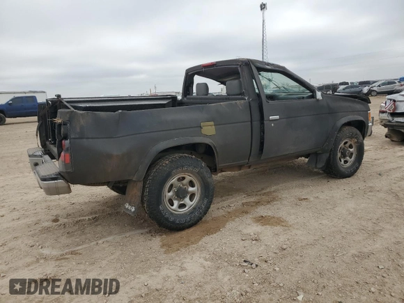 1995 Nissan Frontier XE with VIN 1N6SD11Y2SC308065, listed as a Copart auction lot 45282595 with 51,994 mi miles and Salvage title. Bid and sale history available at DreamBid. Image 3.