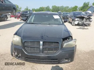 2005 Dodge Magnum SE z VIN 2D4FV48V95H593141, wystawiony jako IAAI lot #42418697 z przebiegiem 226 131 mil mil oraz . Historia ofert i sprzedaży dostępna na DreamBid. Obrazek 12.
