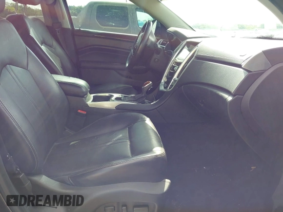 2014 Cadillac SRX Luxury Collection with VIN 3GYFNBE36ES587292, listed as a IAAI auction lot 41944420 with 150,136 mi miles and . Bid and sale history available at DreamBid. Image 5.