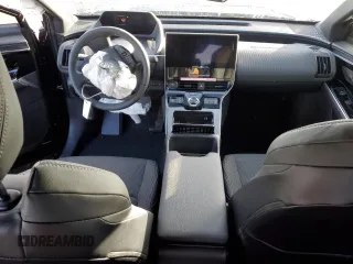 2023 Toyota bZ4X XLE z VIN JTMAAAAA7PA026243, wystawiony jako Copart lot #80972543 z przebiegiem 2 213 mil mil oraz . Historia ofert i sprzedaży dostępna na DreamBid. Obrazek 8.