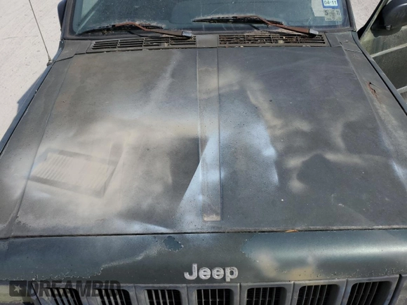 1997 Jeep Cherokee SE with VIN 1J4FT28SXVL540135, listed as a Copart auction lot 77043714 with 0 mi miles and Clean Title. Bid and sale history available at carsss.com. Image 12.