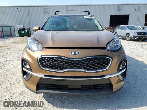 2021 Kia Sportage EX with VIN KNDPN3AC0M7854669, listed as a Copart auction lot 57829275 with 48,520 mi miles and Salvage title. Bid and sale history available at DreamBid. Image 5.