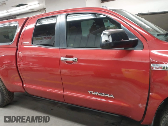 2011 Toyota Tundra 4WD Truck LTD with VIN 5TFBY5F12BX166531, listed as a IAAI auction lot 41680915 with 164,314 mi miles. Bid and sale history available at carsss.com. Image 14.