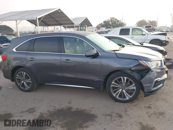 2019 Acura MDX Technology z VIN 5J8YD3H59KL010487, wystawiony jako IAAI lot #41478493 z przebiegiem 55 315 mil mil oraz . Historia ofert i sprzedaży dostępna na DreamBid. Obrazek 13.