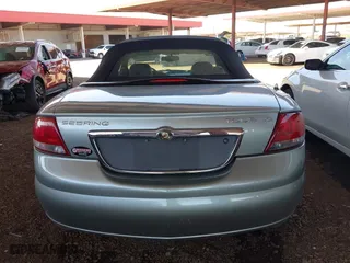 2004 Chrysler Sebring LXi with VIN 1C3EL55R54N338136, listed as a IAAI auction lot 41980206 with 98,572 mi miles. Bid and sale history available at carsss.com. Image 16.