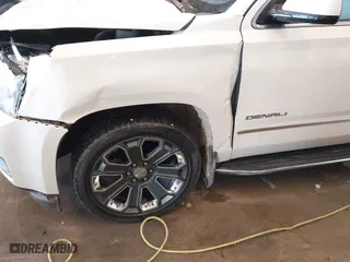 2015 GMC Yukon XL Denali with VIN 1GKS2JKJXFR528927, listed as a IAAI auction lot 41391259 with 159,467 mi miles. Bid and sale history available at carsss.com. Image 6.