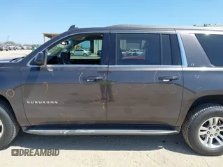 2016 Chevrolet Suburban LT z VIN 1GNSCHKC3GR313126, wystawiony jako IAAI lot #41743640 z przebiegiem 178 351 mil mil oraz . Historia ofert i sprzedaży dostępna na DreamBid. Obrazek 15.