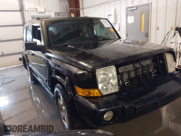 2007 Jeep Commander Sport z VIN 1J8HG48P17C545682, wystawiony jako IAAI lot #41369706 z przebiegiem 187 900 mil mil oraz . Historia ofert i sprzedaży dostępna na DreamBid. Obrazek 1.