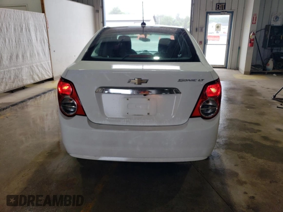 2015 Chevrolet Sonic LT with VIN 1G1JC5SGXF4126055, listed as a Copart auction lot 59579035 with 169,985 mi miles and Salvage title. Bid and sale history available at DreamBid. Image 6.