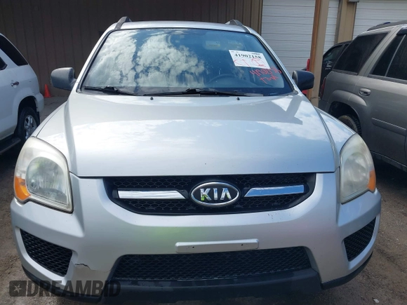 2009 Kia Sportage LX with VIN KNDJF724397572311, listed as a IAAI auction lot 41902158 with 120,899 mi miles and . Bid and sale history available at carsss.com. Image 6.