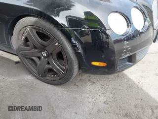 2007 Bentley Continental GT with VIN SCBDR33W67C046257, listed as a IAAI auction lot 41661440 with 54,229 mi miles and . Bid and sale history available at DreamBid. Image 6.