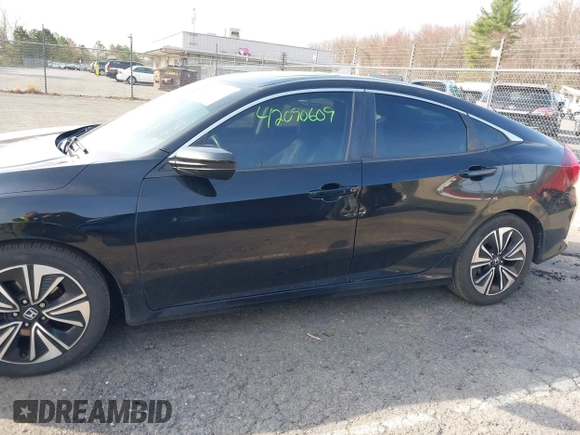 2016 Honda Civic Sedan EX-L with VIN 2HGFC1F77GH636904, listed as a IAAI auction lot 42090609 with 176,968 mi miles. Bid and sale history available at carsss.com. Image 14.