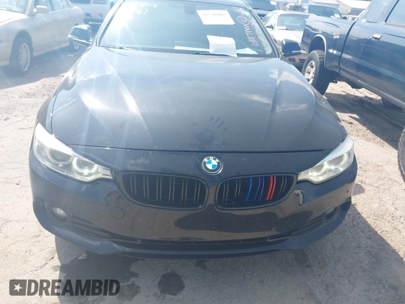 2014 BMW 4 Series 428i xDrive with VIN WBA3N5C52EF716998, listed as a IAAI auction lot 42548467 with 212,418 mi miles and . Bid and sale history available at DreamBid. Image 12.