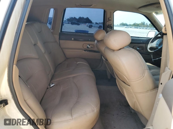 1997 Lincoln Town Car Signature z VIN 1LNLM82W9VY681894, wystawiony jako Copart lot #71467034 z przebiegiem 129 142 mil mil oraz Szkody całkowita. Historia ofert i sprzedaży dostępna na DreamBid. Obrazek 10.