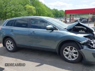 2012 Mazda CX-9 Touring z VIN JM3TB3CV0C0352698, wystawiony jako IAAI lot #42092613 z przebiegiem 75 118 mil mil oraz . Historia ofert i sprzedaży dostępna na DreamBid. Obrazek 13.