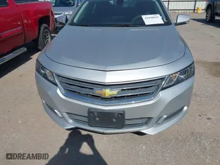 2016 Chevrolet Impala LT with VIN 2G1115S33G9103539, listed as a IAAI auction lot 41998565 with 128,595 mi miles. Bid and sale history available at carsss.com. Image 6.