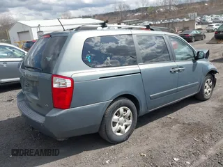 2009 Kia Sedona LX with VIN KNDMB233696299758, listed as a IAAI auction lot 41929906 with 214,445 mi miles. Bid and sale history available at carsss.com. Image 4.