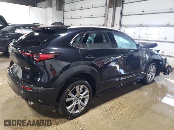 2023 Mazda CX-30 S Premium with VIN 3MVDMBDM0PM520591, listed as a Copart auction lot 48178215 with 9,999 mi miles and Salvage Title. Bid and sale history available at DreamBid. Image 3.