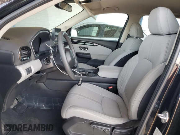 2023 Honda Pilot LX with VIN 5FNYG2H29PB015544, listed as a Copart auction lot 63485214 with 7,991 mi miles and Salvage Title. Bid and sale history available at carsss.com. Image 7.