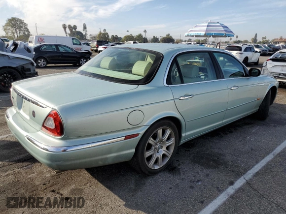 2005 Jaguar XJ with VIN SAJWA79C15SG47018, listed as a Copart auction lot 43087185 with 31,725 mi miles and Salvage Title. Bid and sale history available at carsss.com. Image 3.