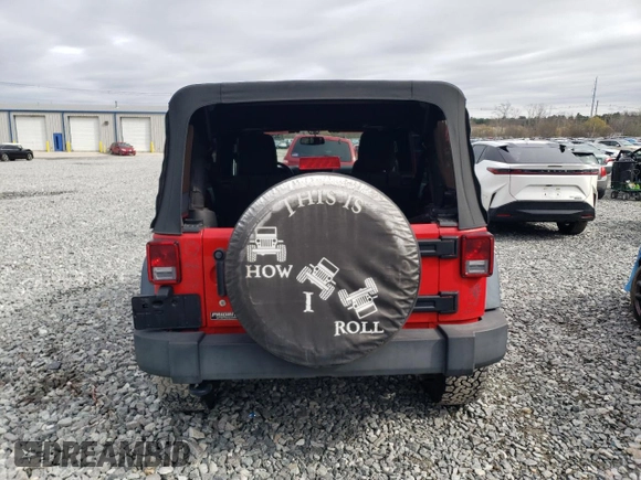 2015 Jeep Wrangler Unlimited Willys Wheeler with VIN 1C4BJWDG2FL542045, listed as a Copart auction lot 52903465 with 86,205 mi miles and Clean Title. Bid and sale history available at DreamBid. Image 6.