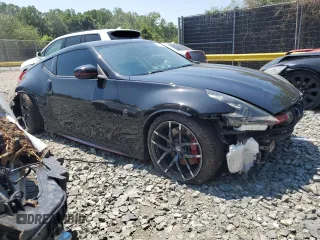 2016 Nissan 370Z with VIN JN1AZ4EH6GM936789, listed as a Copart auction lot 61375874 with 65,169 mi miles and Salvage Title. Bid and sale history available at carsss.com. Image 4.