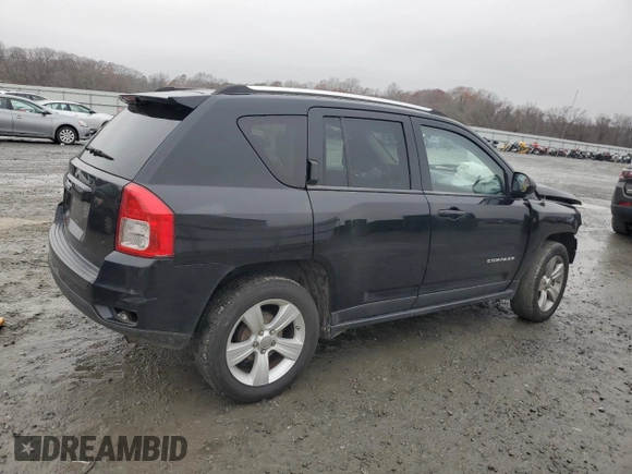 2012 Jeep Compass Sport with VIN 1C4NJCBB2CD613575, listed as a Copart auction lot 85057354 with 203,677 mi miles and Salvage Title. Bid and sale history available at carsss.com. Image 3.