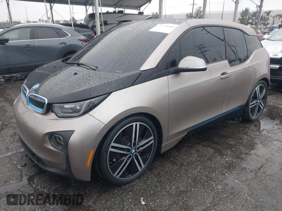 2014 BMW i3 with VIN WBY1Z4C58EV276329, listed as a IAAI auction lot 41570602 with 87,925 mi miles and . Bid and sale history available at DreamBid. Image 2.