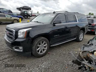 2015 GMC Yukon XL SLT z VIN 1GKS2HKC1FR695168, wystawiony jako Copart lot #54665975 z przebiegiem 132 545 mil mil oraz Szkoda całkowita • Salvage title. Historia ofert i sprzedaży dostępna na DreamBid. Obrazek 1.