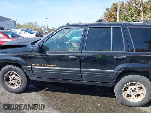 1997 Jeep Grand Cherokee Limited with VIN 1J4GZ78Y1VC658515, listed as a IAAI auction lot 41897266 with 164,033 mi miles and . Bid and sale history available at DreamBid. Image 14.