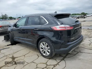 2020 Ford Edge Titanium с VIN 2FMPK3K93LBB56277, выставлен на аукционе Copart как лот 57502985 с пробегом 80 352 миль миль и Списание • Salvage title. История ставок и продаж доступна на DreamBid. Изображение 2.