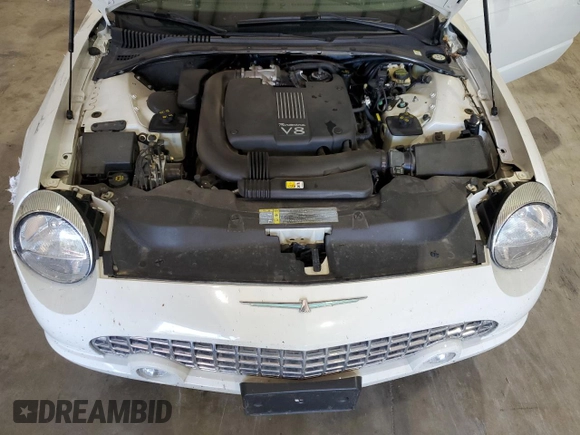 2002 Ford Thunderbird Hardtop Premium with VIN 1FAHP60A32Y125580, listed as a Copart auction lot 77493514 with 74,619 mi miles and Salvage Title. Bid and sale history available at DreamBid. Image 13.