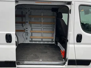 2023 Ram ProMaster Cargo with VIN 3C6LRVVG7PE572634, listed as a Copart auction lot 50415055 with 17,990 mi miles and Clean Title. Bid and sale history available at DreamBid. Image 6.