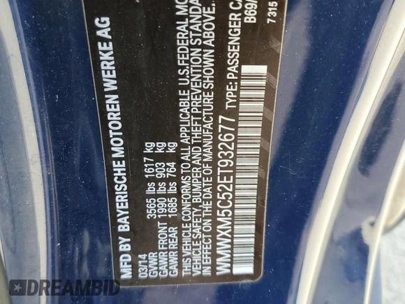 2014 MINI Hardtop with VIN WMWXM5C52ET932677, listed as a Copart auction lot 53486865 with 189,039 mi miles and Salvage title. Bid and sale history available at DreamBid. Image 12.