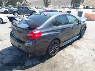 2016 Subaru WRX STI with VIN JF1VA2M65G9824049, listed as a IAAI auction lot 42517527 with 117,883 mi miles and . Bid and sale history available at DreamBid. Image 4.