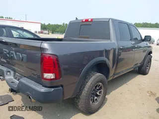 2017 Ram 1500 Rebel with VIN 1C6RR7YT6HS861839, listed as a IAAI auction lot 42407025 with 127,084 mi miles and . Bid and sale history available at DreamBid. Image 4.