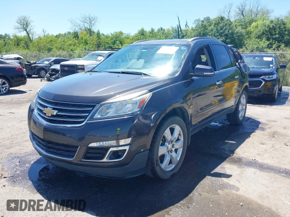 2017 Chevrolet Traverse LT with VIN 1GNKRGKD7HJ129888, listed as a IAAI auction lot 42009764 with 136,091 mi miles and . Bid and sale history available at DreamBid. Image 2.