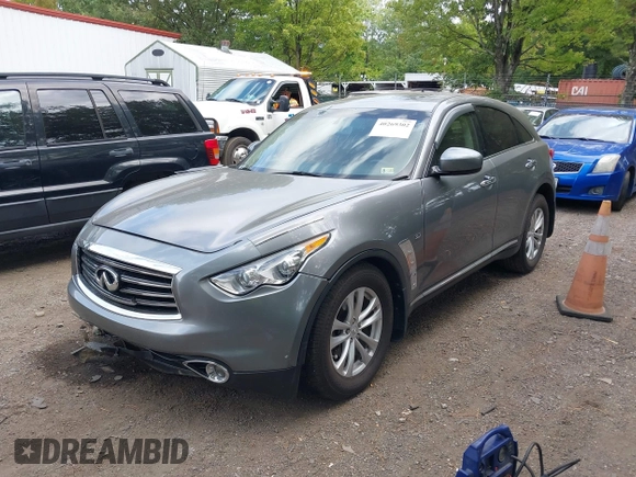 2014 Infiniti QX70 with VIN JN8CS1MW9EM413406, listed as a IAAI auction lot 40269302 with 123,957 mi miles and . Bid and sale history available at DreamBid. Image 2.