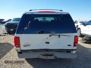1999 Ford Expedition XLT z VIN 1FMPU18L2XLB77547, wystawiony jako IAAI lot #41161721 z przebiegiem 205 649 mil mil oraz . Historia ofert i sprzedaży dostępna na DreamBid. Obrazek 16.