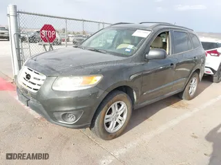 2012 Hyundai Santa Fe GLS with VIN 5XYZG3AB2CG128873, listed as a IAAI auction lot 41874808 with 182,453 mi miles. Bid and sale history available at carsss.com. Image 2.