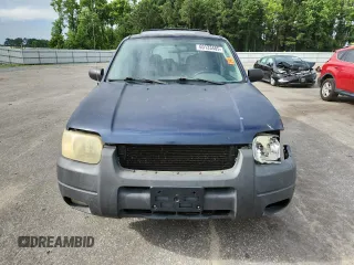 2003 Ford Escape XLT Popular with VIN 1FMCU03123KA03878, listed as a Copart auction lot 60133485 with 298,100 mi miles and Salvage title. Bid and sale history available at DreamBid. Image 5.