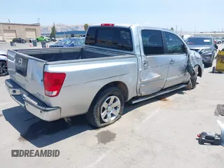 2007 Nissan Titan XE with VIN 1N6AA07A57N200866, listed as a IAAI auction lot 42563440 with 193,188 mi miles and . Bid and sale history available at DreamBid. Image 4.
