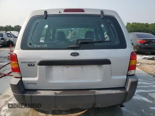 2002 Ford Escape XLS Choice z VIN 1FMYU01102KB13125, wystawiony jako Copart lot #59034495 z przebiegiem 202 253 mil mil oraz Szkoda całkowita • Salvage title. Historia ofert i sprzedaży dostępna na DreamBid. Obrazek 6.
