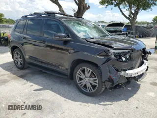 2021 Honda Passport EX-L with VIN 5FNYF7H58MB005187, listed as a Copart auction lot 60414535 with 75,208 mi miles and Salvage title. Bid and sale history available at DreamBid. Image 4.