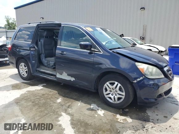 2005 Honda Odyssey EX-L z VIN 5FNRL38775B014777, wystawiony jako Copart lot #56245735 z przebiegiem 222 798 mil mil oraz Szkoda całkowita • Salvage title. Historia ofert i sprzedaży dostępna na DreamBid. Obrazek 4.