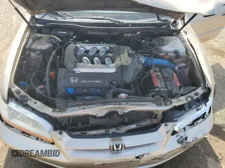 2000 Honda Accord EX z VIN 1HGCG165XYA098317, wystawiony jako Copart lot #57246705 z przebiegiem 242 166 mil mil oraz Szkoda całkowita • Salvage title. Historia ofert i sprzedaży dostępna na DreamBid. Obrazek 11.