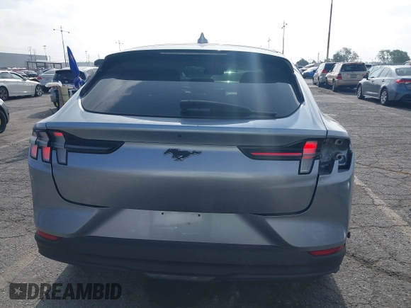 2022 Ford Mustang Mach-E Select z VIN 3FMTK1SSXNMA14614, wystawiony jako IAAI lot #42235651 z przebiegiem 45 998 mil mil oraz . Historia ofert i sprzedaży dostępna na DreamBid. Obrazek 17.