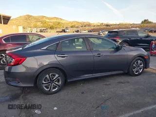 2016 Honda Civic Sedan LX with VIN 2HGFC2F55GH532108, listed as a IAAI auction lot 41860382 with 124,106 mi miles. Bid and sale history available at carsss.com. Image 13.